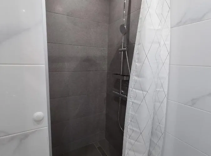 жилищна сграда орех Апартаменти *